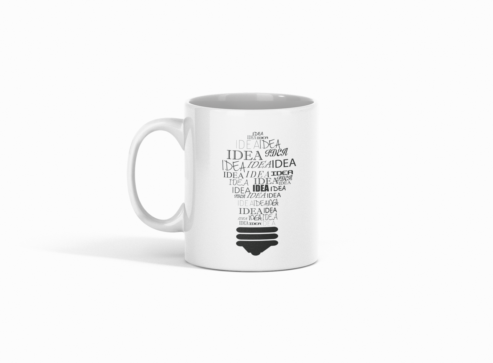White Coffee Mug featuring "Idea" in light bulb design.